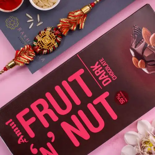 Premium Om Rakhi N Amul Fruit n Nut Chocolate Combo